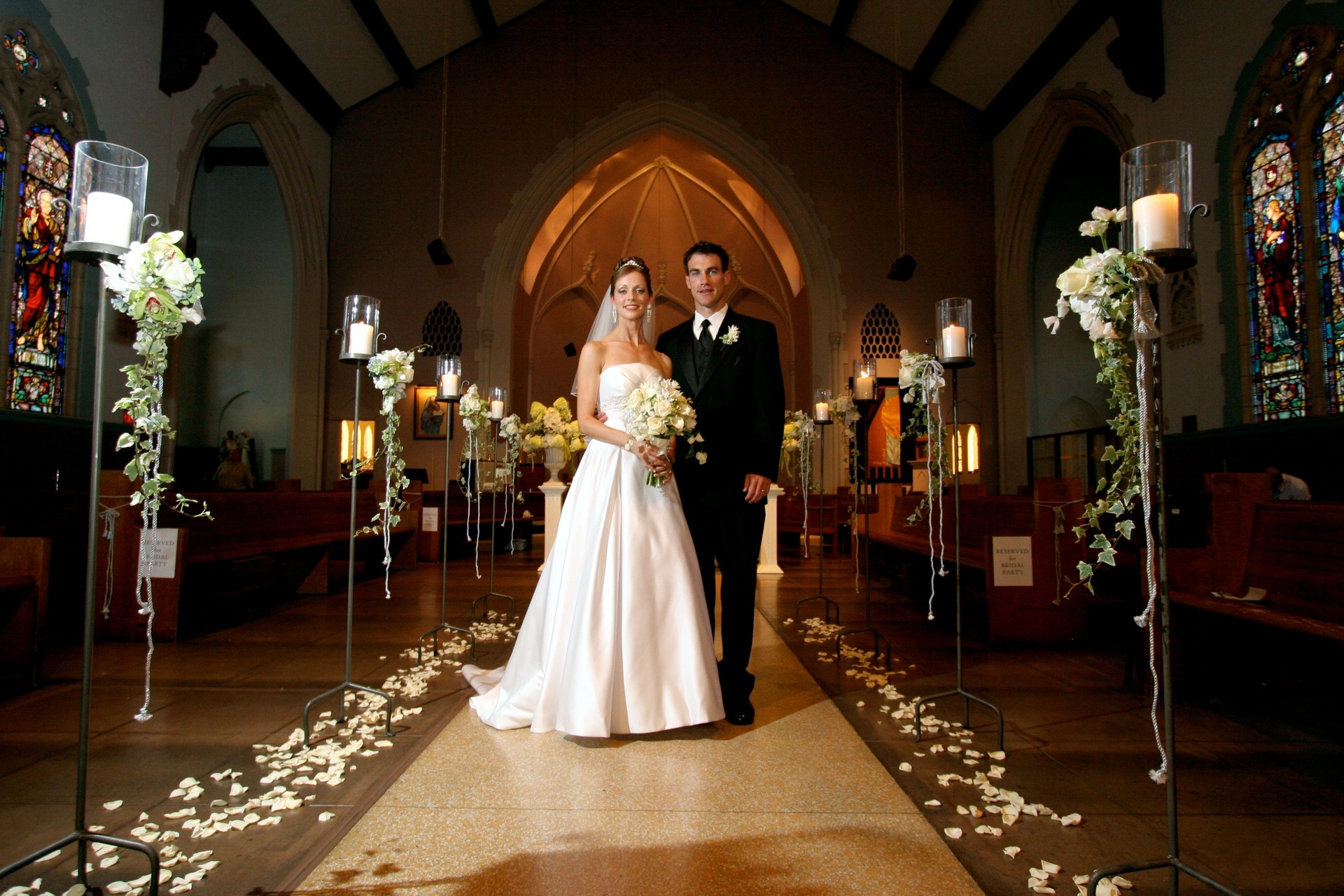 Wedding Portrait Bride and Groom Couple Inside Old Church Aisle
